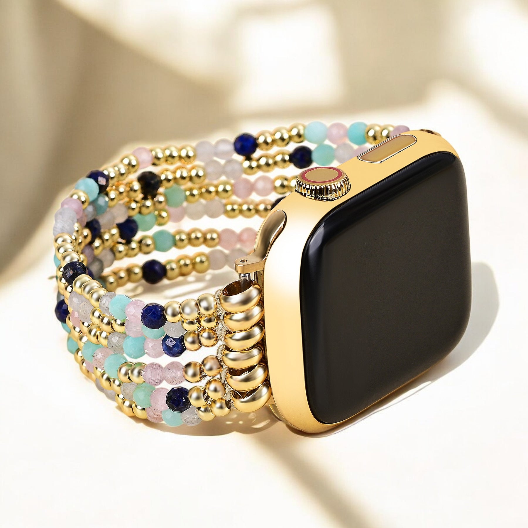골드 및 펄 스트레치 Apple Watch 스트랩