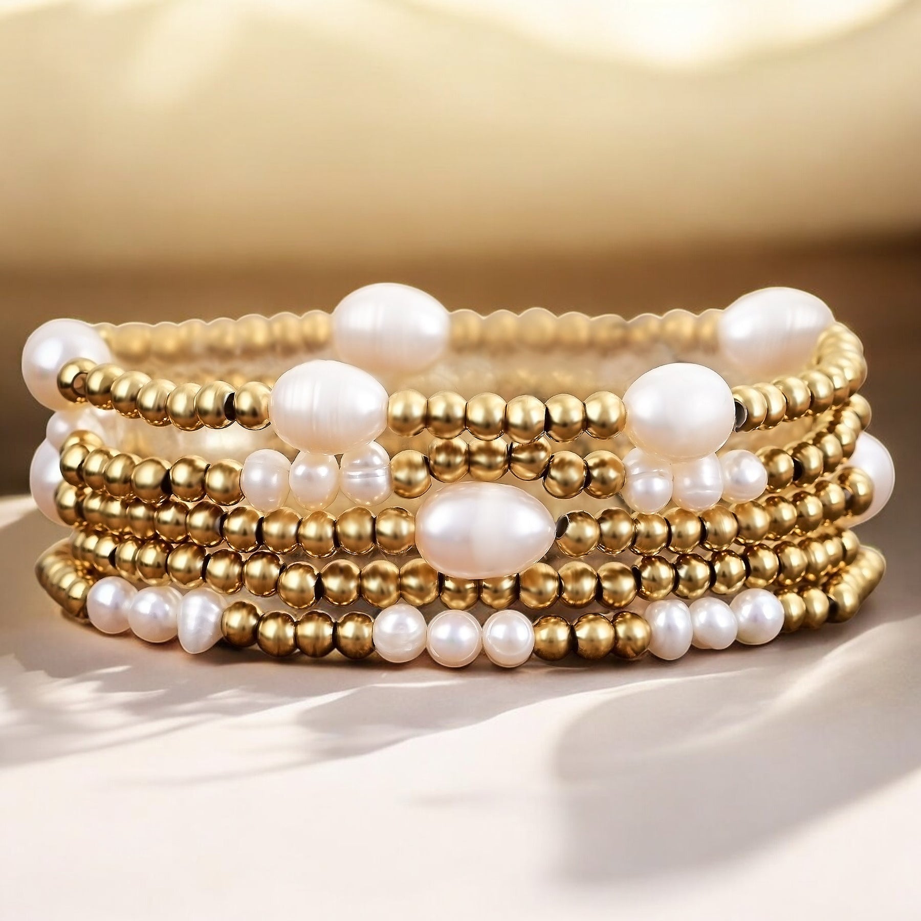 Gold and Pearl Bracelet Set